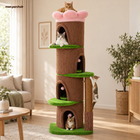 Arbre à chat XXL avec 4 niches et couchage fleur, en situation dans un salon